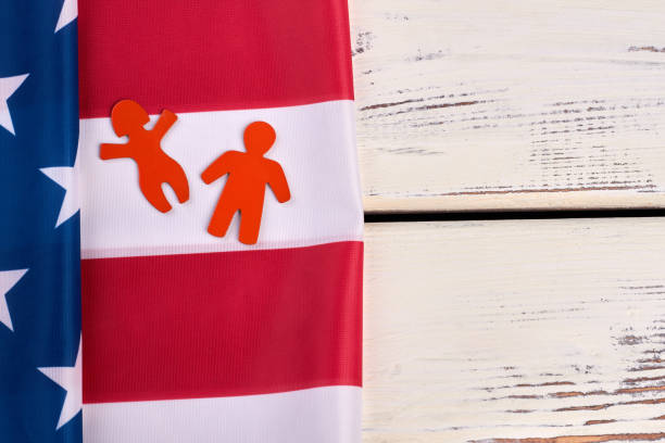 istock American flag on wooden background, copy space. 969231774