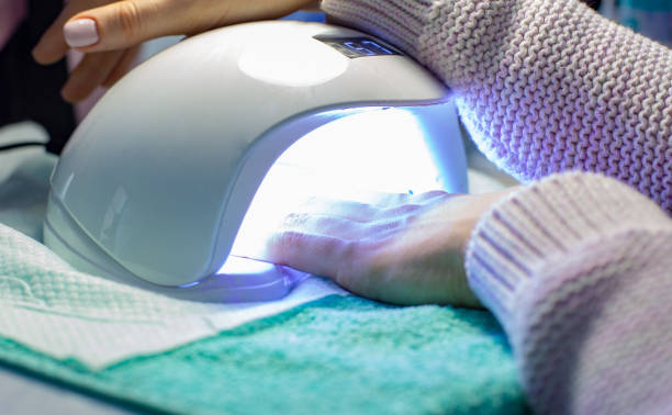 istock The master does a manicure in the salon 969234802