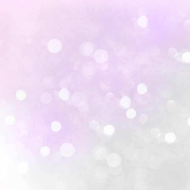 istock LIGHT PURPLE BLURRED BACKGROUND BOKEH, glitter,white circles 969234990