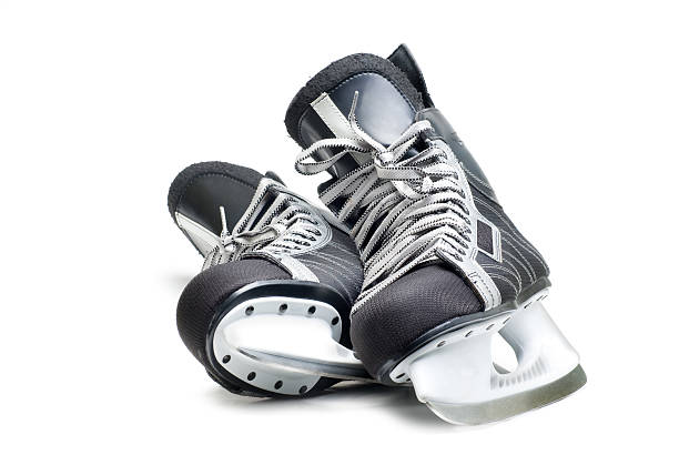 Man's hockey skates stock photo