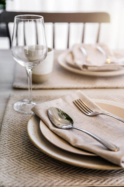 istock dining set with dish and spoon on white clean napkin 969259122
