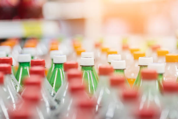 istock Rows of  plastic bottles cap with bllur background 969259178