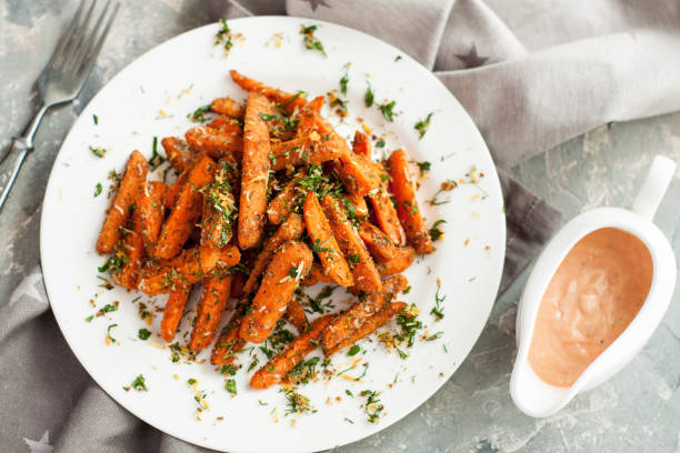 istock Baby carrots roasted with parmesan and herbs 969261910