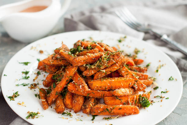 istock Baby carrots roasted with parmesan and herbs 969261918