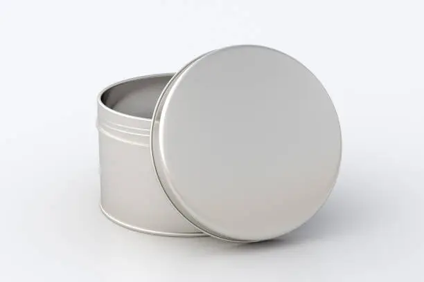 Blank silver metal round tin container box with opened lid on white background. Package mockup with clipping path around container. 3d illustration