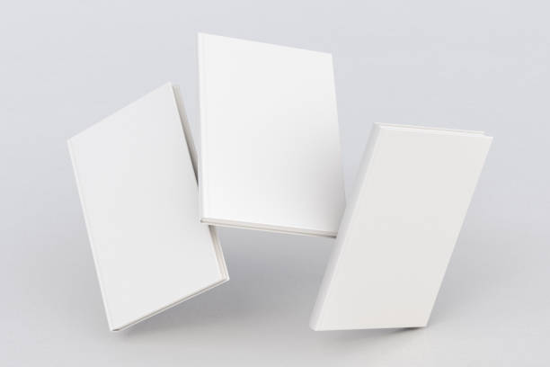 blank book cover flying White vertical three blank book cover flying over white background with clipping path around each book cover. 3d illustration multiple magazine covers stock pictures, royalty-free photos & images