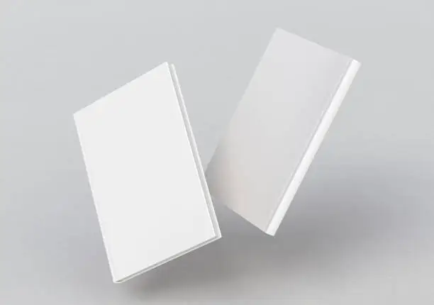 Photo of blank book cover flying