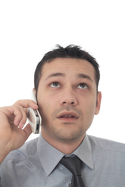 istock handsome businessman talking on a mobile phone 96927181