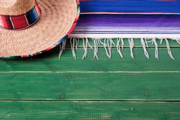 istock Mexico Cinco de Mayo wood background Mexican hat 969274940