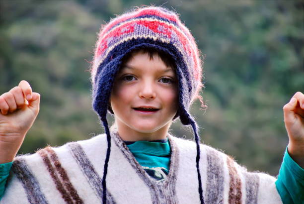 istock Boy in warm clothes looks to camera 969282194