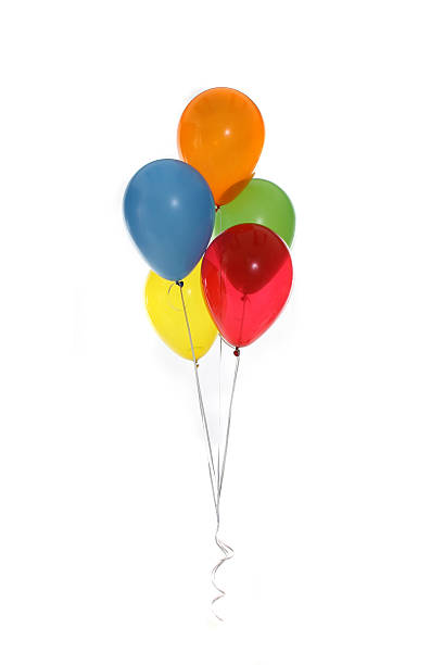 Five floating balloons against white background stock photo