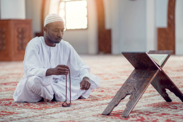 istock African Muslim Man Making Traditional Prayer To God While Wearing Dishdasha 969290922