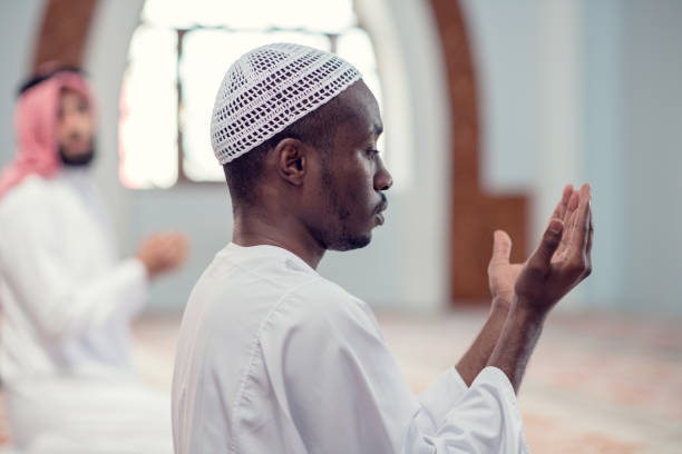 istock Two religious muslim man praying together inside the mosque 969290986