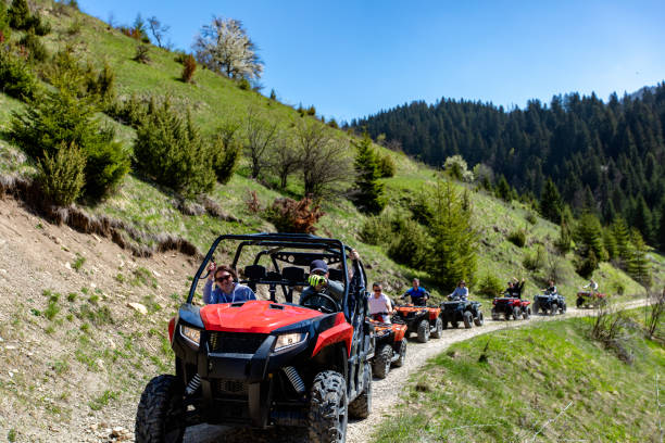 istock A tour group travels on ATVs and UTVs on the mountains 969294080