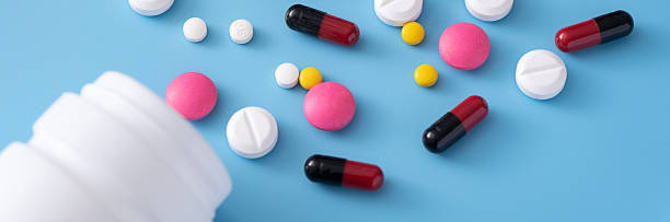 istock medicine  pills on blue background Copy space for text Assorted pharmaceutical Healthy Eating, Lifestyle 969296816