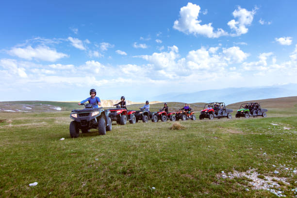 istock A tour group travels on ATVs and UTVs on the mountains 969297000