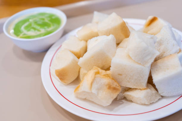 istock Steam bread with green custard dipping 969298306