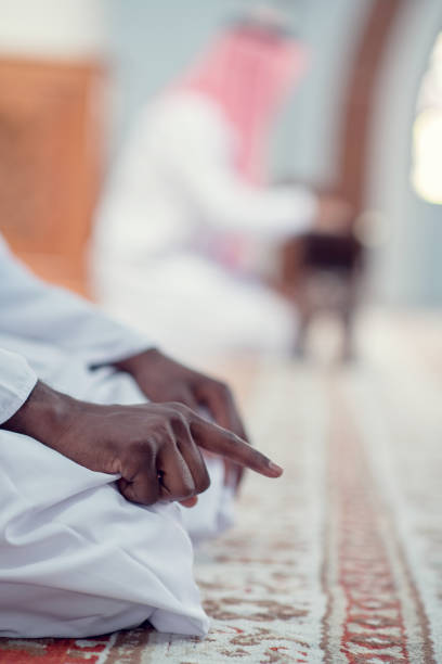 istock African Muslim Man Making Traditional Prayer To God While Wearing Dishdasha 969301150