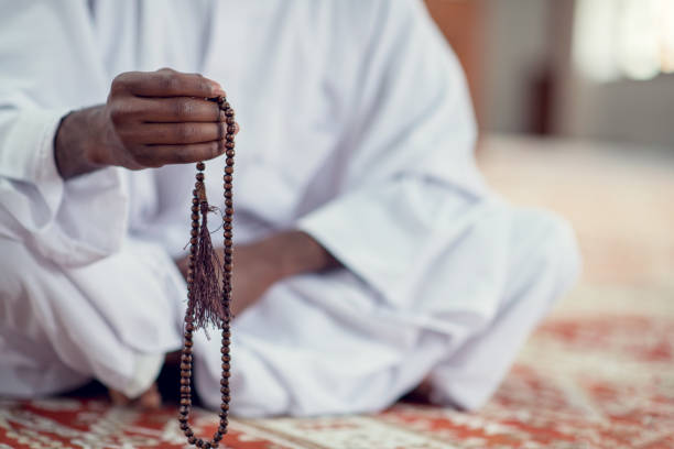istock African Muslim Man Making Traditional Prayer To God While Wearing Dishdasha 969306180