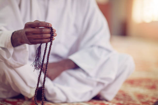 istock African Muslim Man Making Traditional Prayer To God While Wearing Dishdasha 969306212