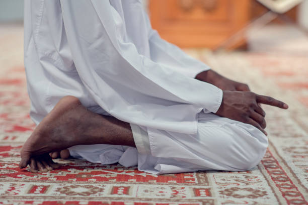 istock Two religious muslim man praying together inside the mosque 969313734