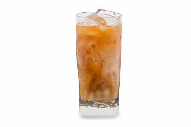 istock Iced coffee in a glass isolated and white background 969314098
