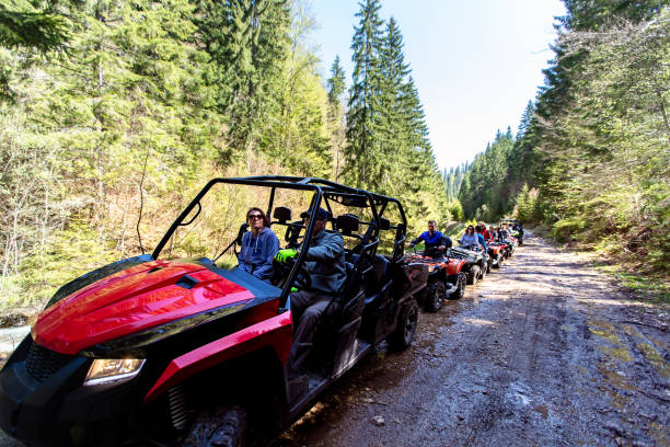 istock A tour group travels on ATVs and UTVs on the mountains 969314272