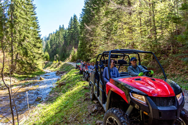 istock A tour group travels on ATVs and UTVs on the mountains 969314458