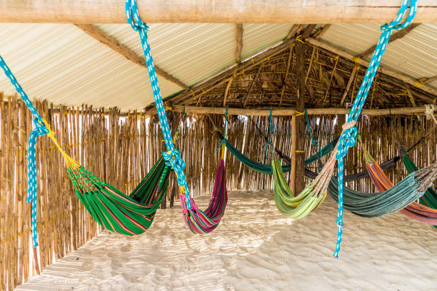 basic dormitory in paradise a basic hammock dormitory in the San Blas islands kuna yala stock pictures, royalty-free photos & images