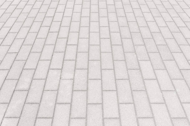 istock Outdoor stone block tile floor background and texture pattern 969318266