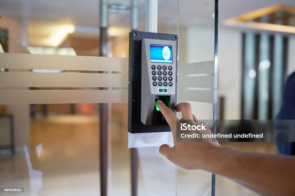 Electronic door  control device Yong man push down the electronic control machine to access the door Accessibility Stock Photo