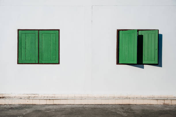 istock green wood window frame on white wall by walkway 969330362