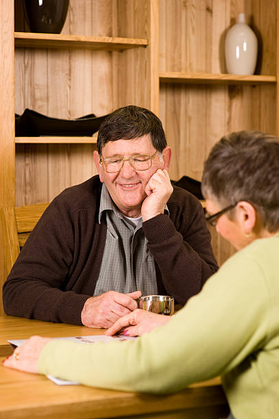 istock Senior couple looking at brochure 96933133