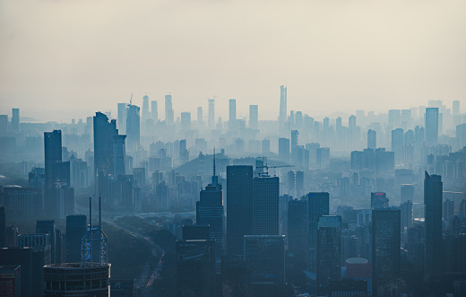 Skyscraper in downtown of Hong Kong city in fog