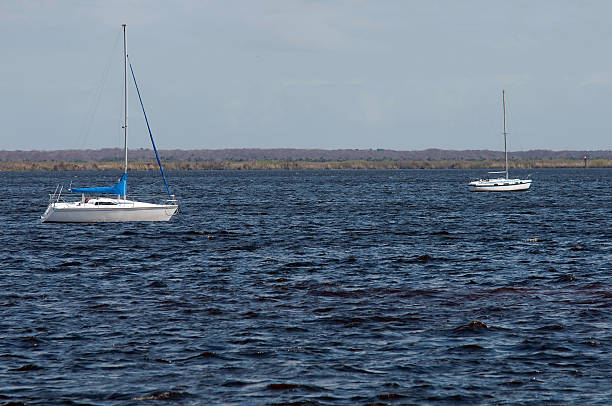 istock Two Sailboats on the Water 96933608