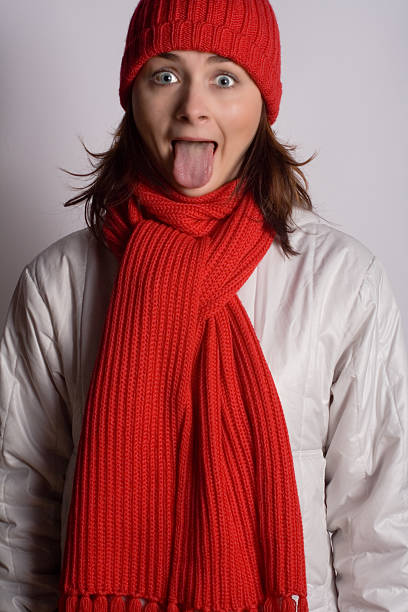 SILLY WOMAN IN WINTER CLOTHES stock photo