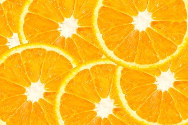 istock top view of orange slice fruit on color background . 969353320
