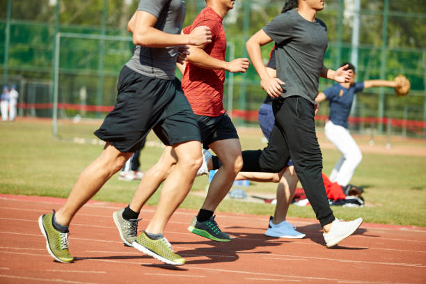 istock young asian adult men running training on track 969360182