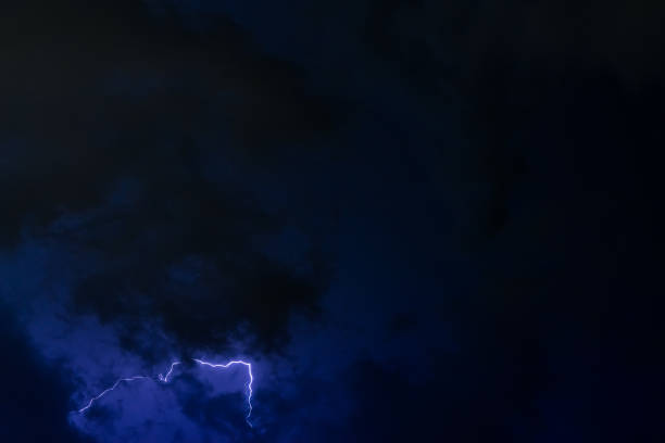 istock Stroke of lightning with storm clouds 969360216
