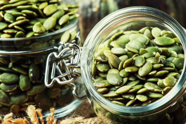 istock Raw pumpkin seeds, healthy snack 969360280