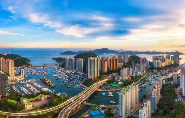 Aerial view of the Aberdeen Harbour Panoramic Aerial view of the Aberdeen Harbour (Aberdeen Typhoon Shelter) and Ap Lei Chau Bridge in Hong Kong aberdeen hong kong photos stock pictures, royalty-free photos & images