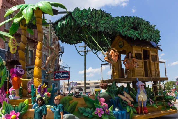 MARDI GRAS in colorful wooden characters on background of confetti