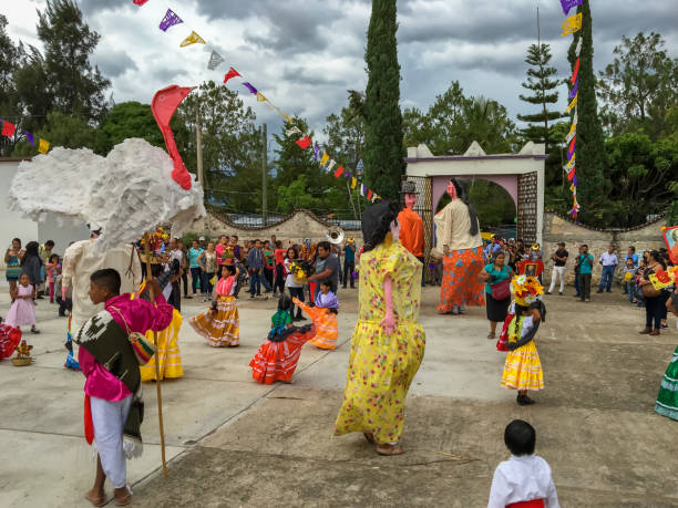 Mojigangas and children dancing at Calenda San Pedro stock photo