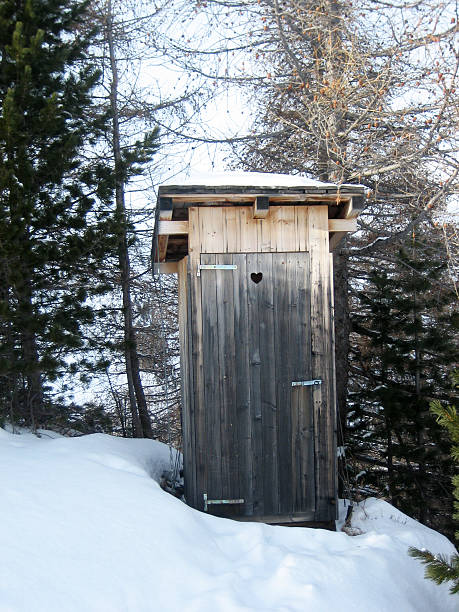 Old outhouse stock photo