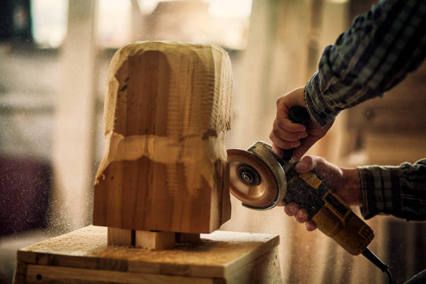 istock A young man carpenter saw sculpture 969402774