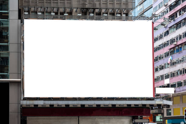 белый большой рекламный щит в аренду на строительство - hong kong billboard asia china стоковые фото и изображения