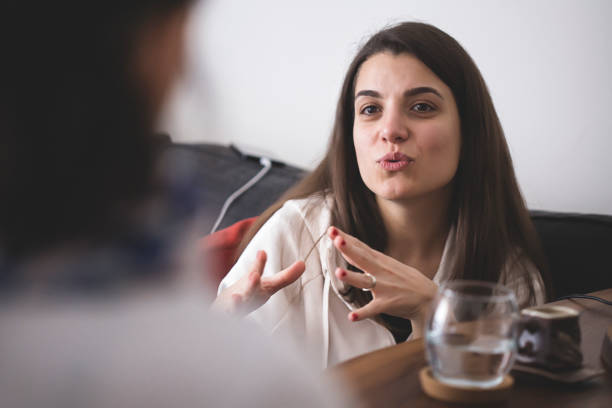 Woman telling to friend about her problems