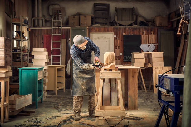 istock A young man carpenter saw sculpture 969407394