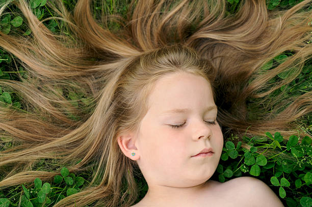 istock Little girl sunbathing 96940757