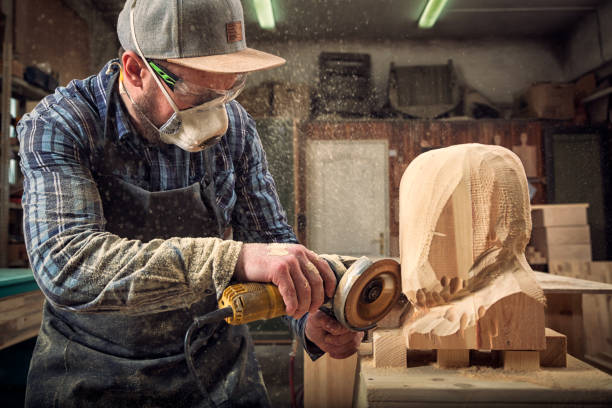 istock A young man carpenter saw sculpture 969407622